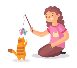 Mujer sentada en el suelo jugando con su gato