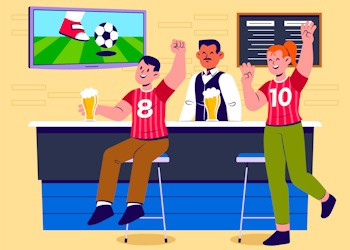 Aficionados de futbol tomando unas cervezas en un bar mientras ven el partido