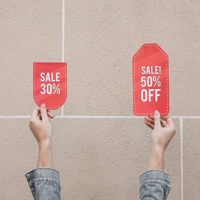 woman's hands with some vouchers code