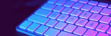 purple and blue keyboard with letters for Cyber Monday