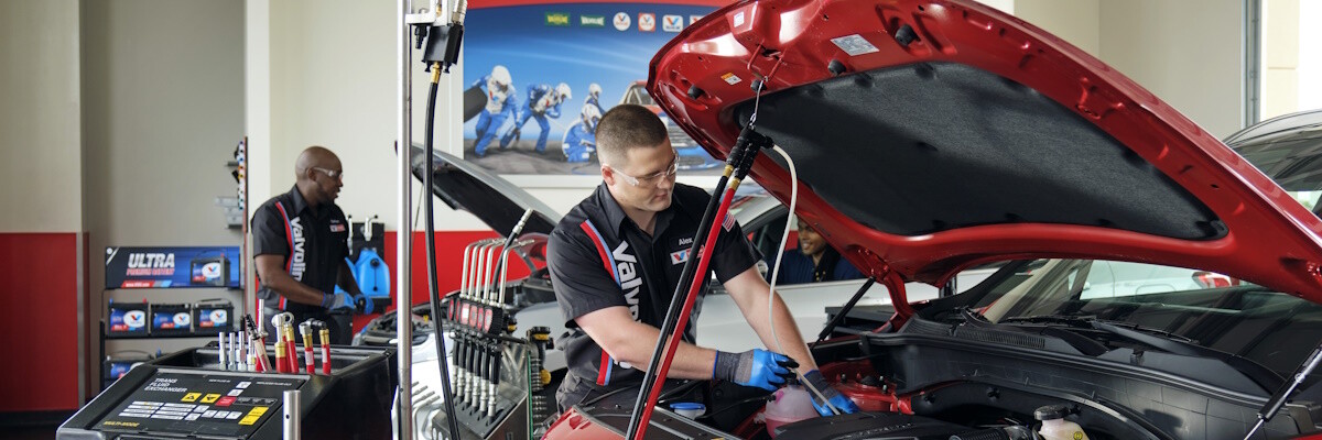 Valvoline mechanic changing the car's oil